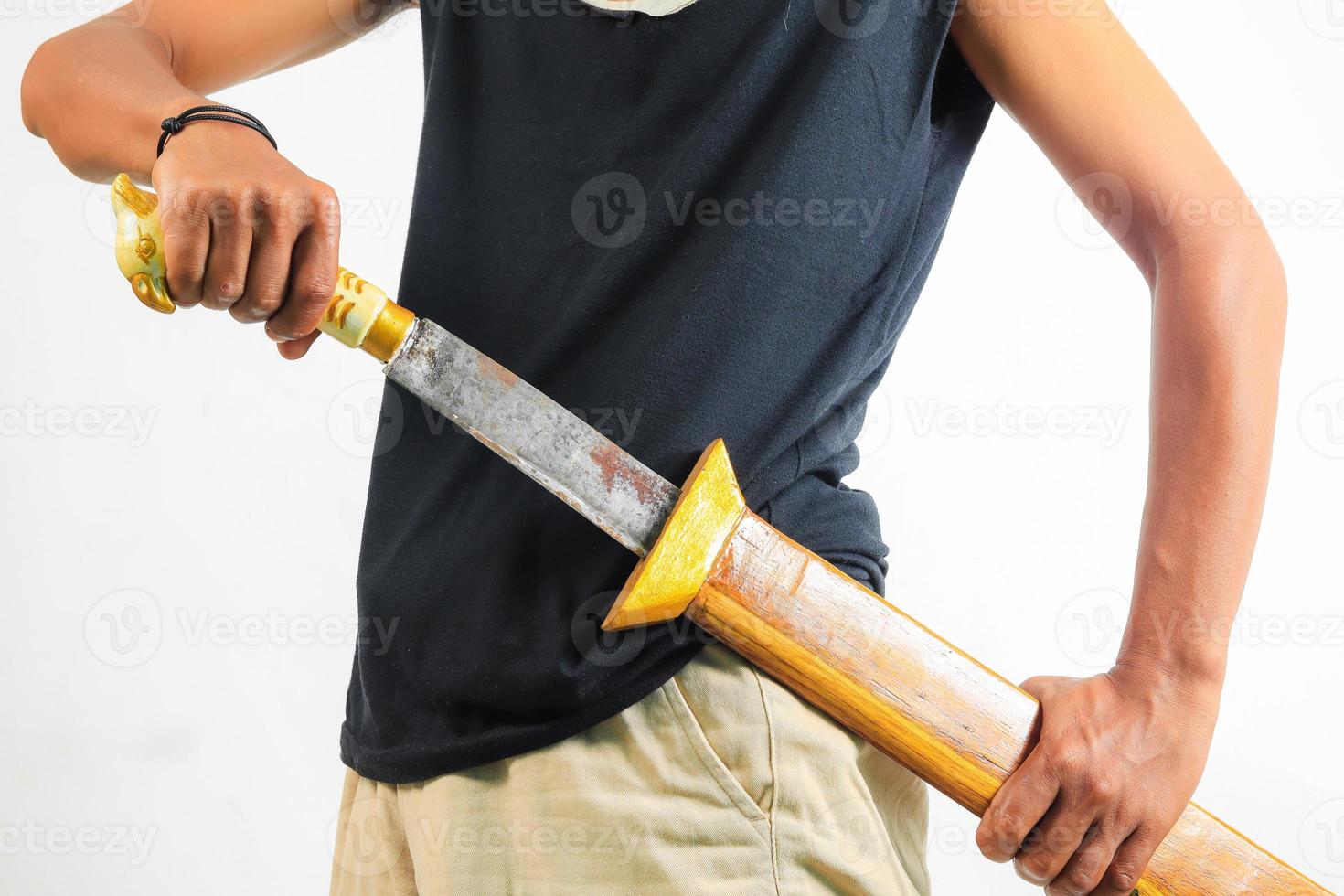 Man holding machete isolated photo
