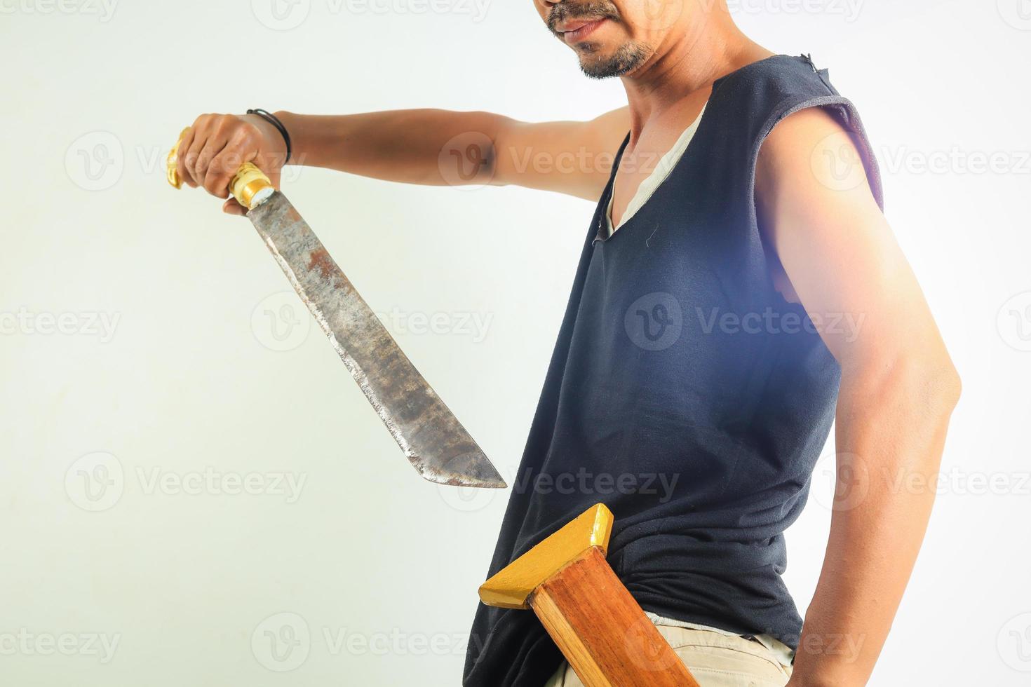 Man holding machete isolated 11505294 Stock Photo at Vecteezy