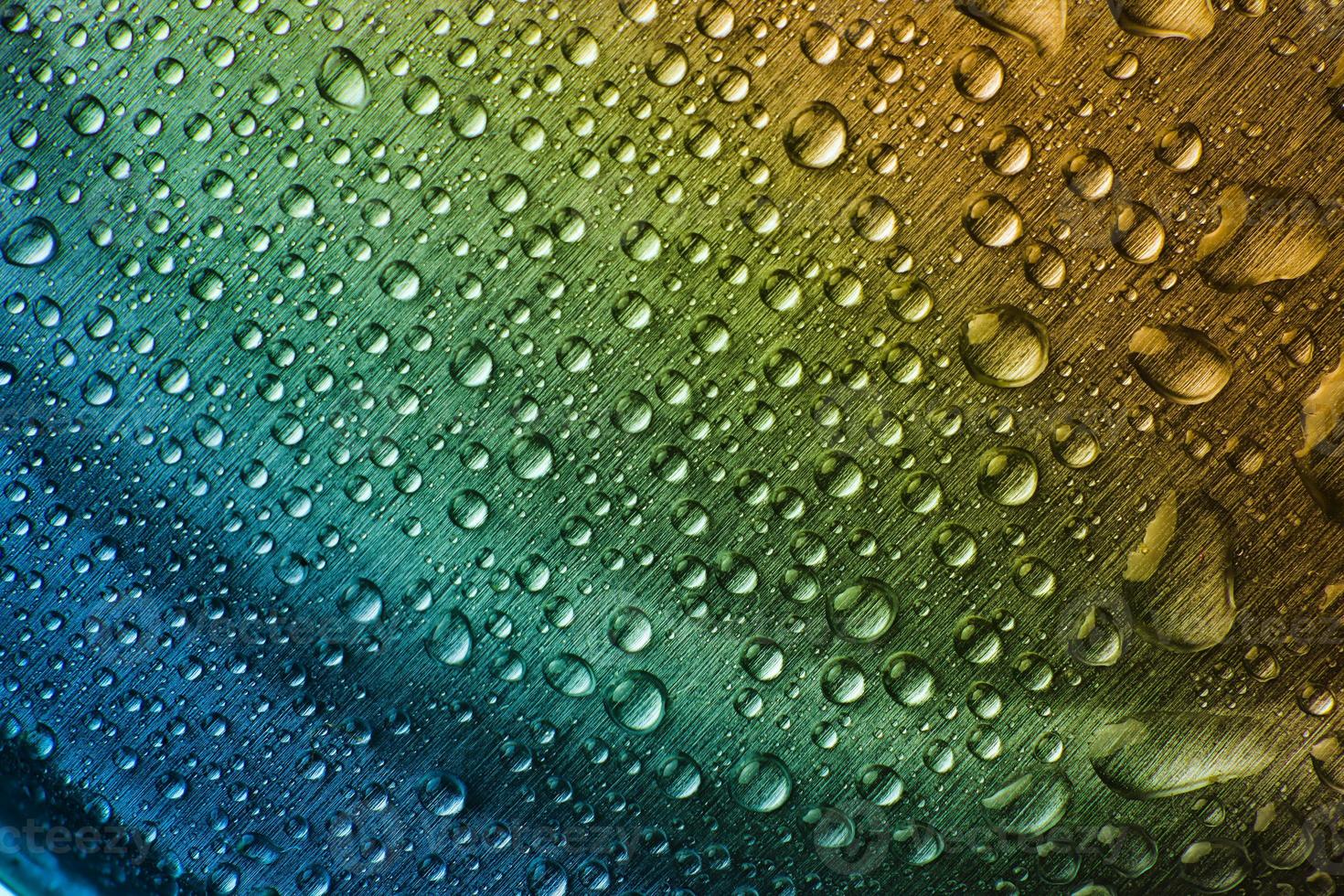 Abstract droplets on metal surface. photo