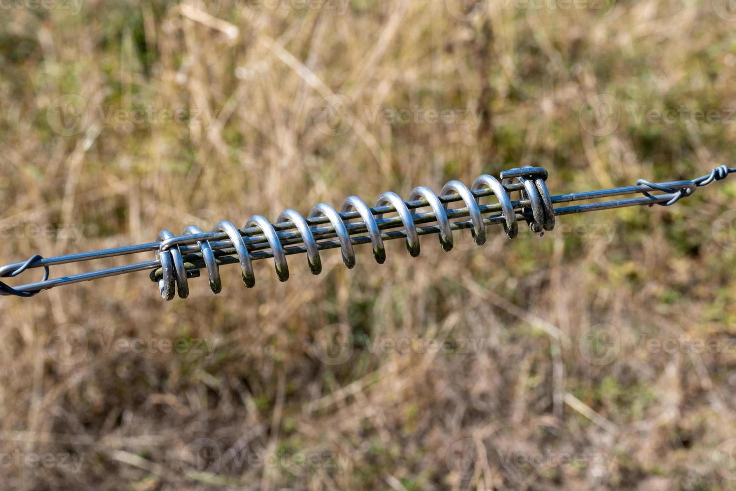 tension spring for metal fence photo