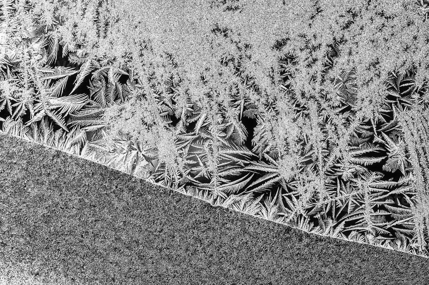 Frost on glass window photo