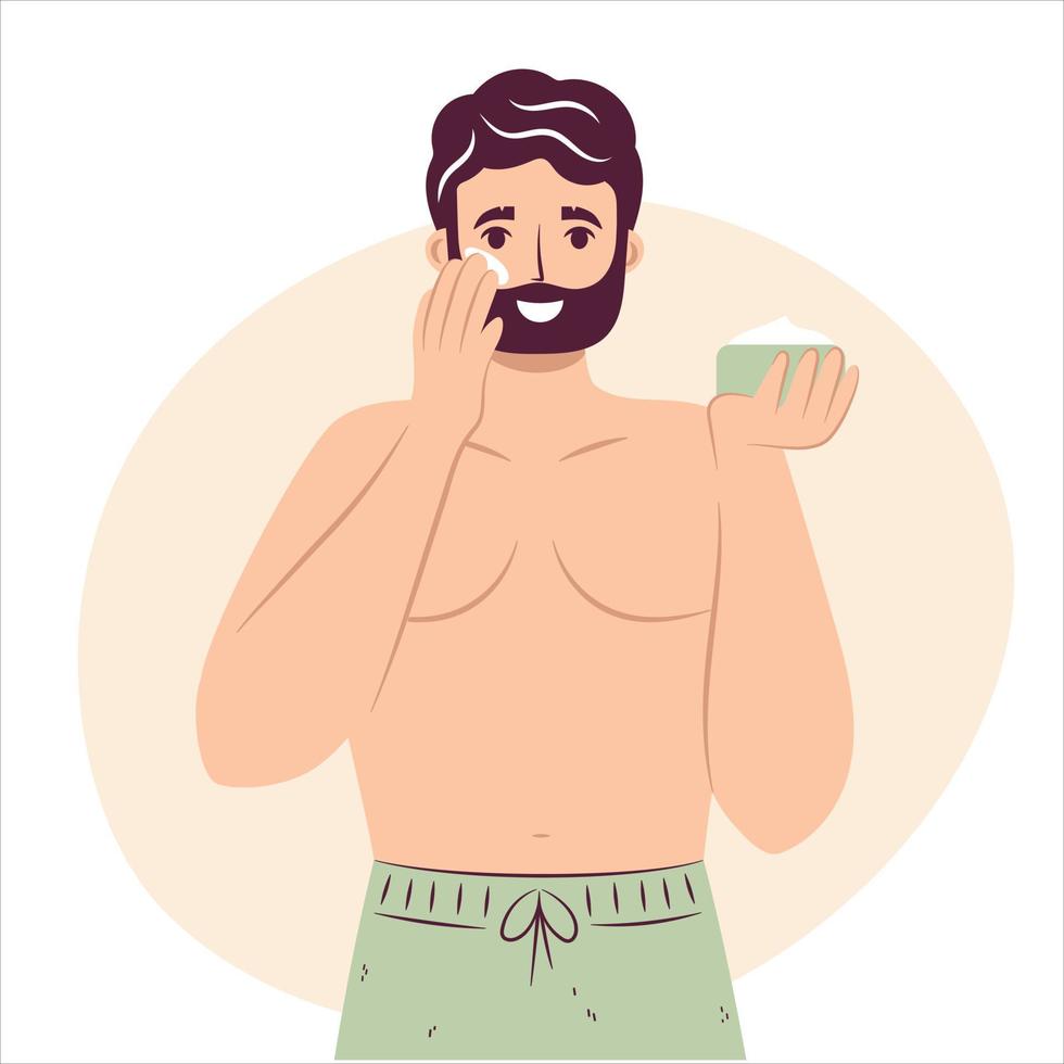 Skincare routine concept. Happy young man applying face moisturizing cream or lotion on cheek, handsome bearded male enjoying skincare procedure. vector