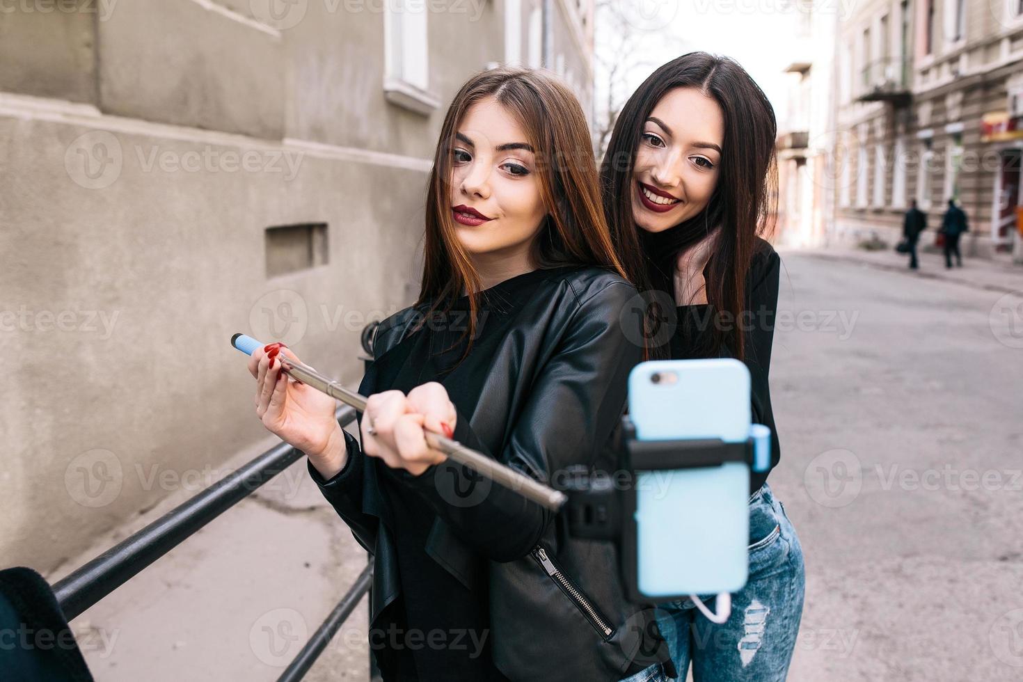 Two young adult girls photo