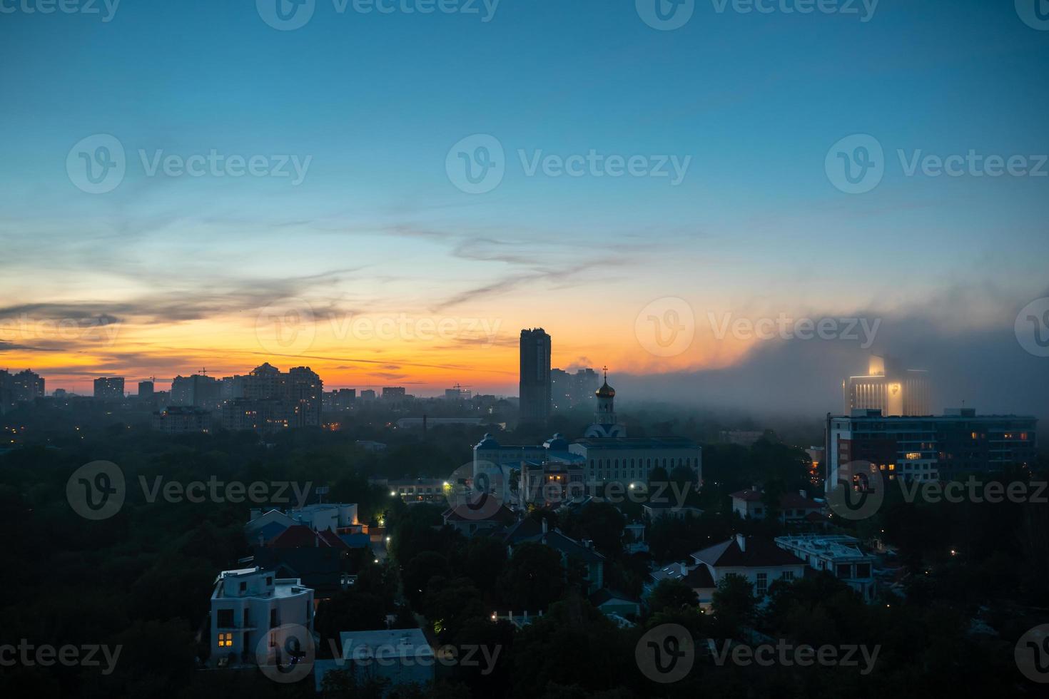 View of residential buildings at the sunset with cloudy sky. photo