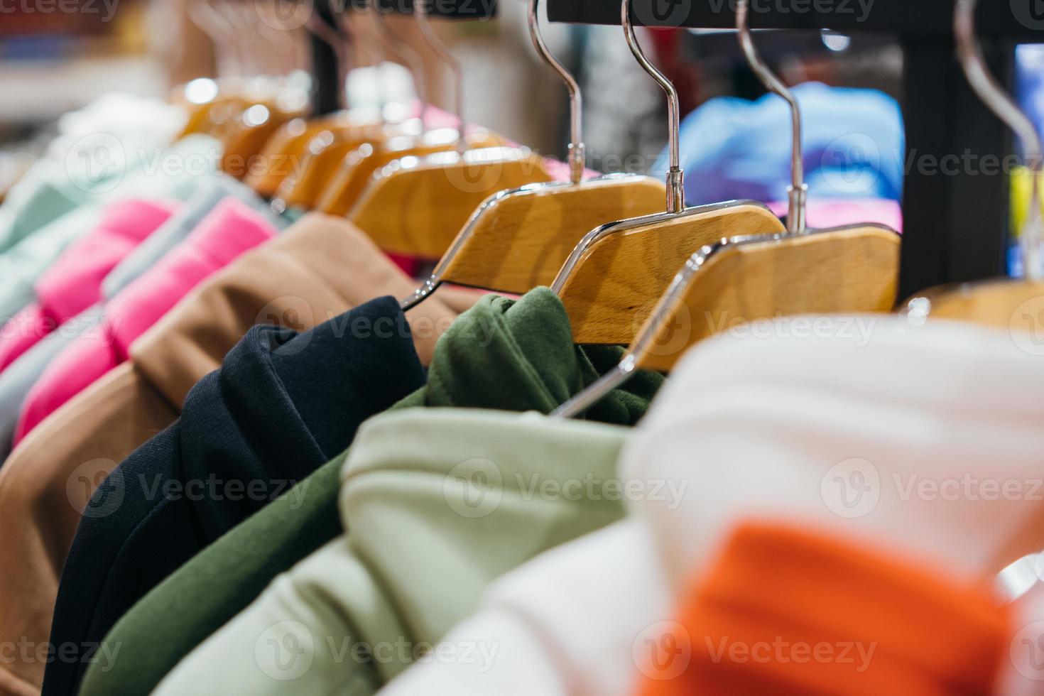 fashion clothing on hangers at the show photo