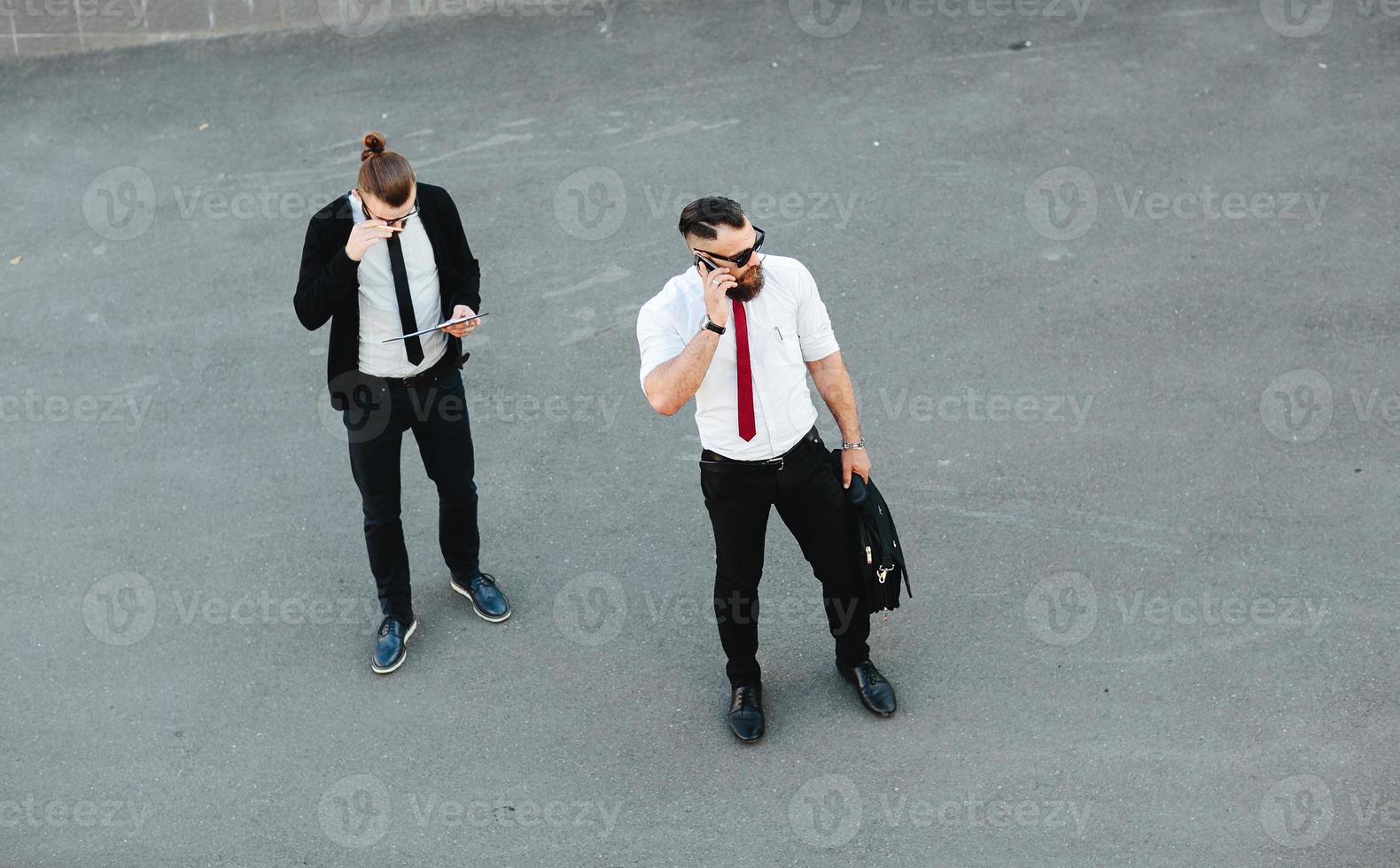 Two businessman at work photo