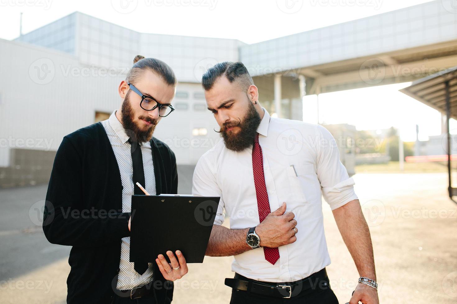 Two businessman at work photo