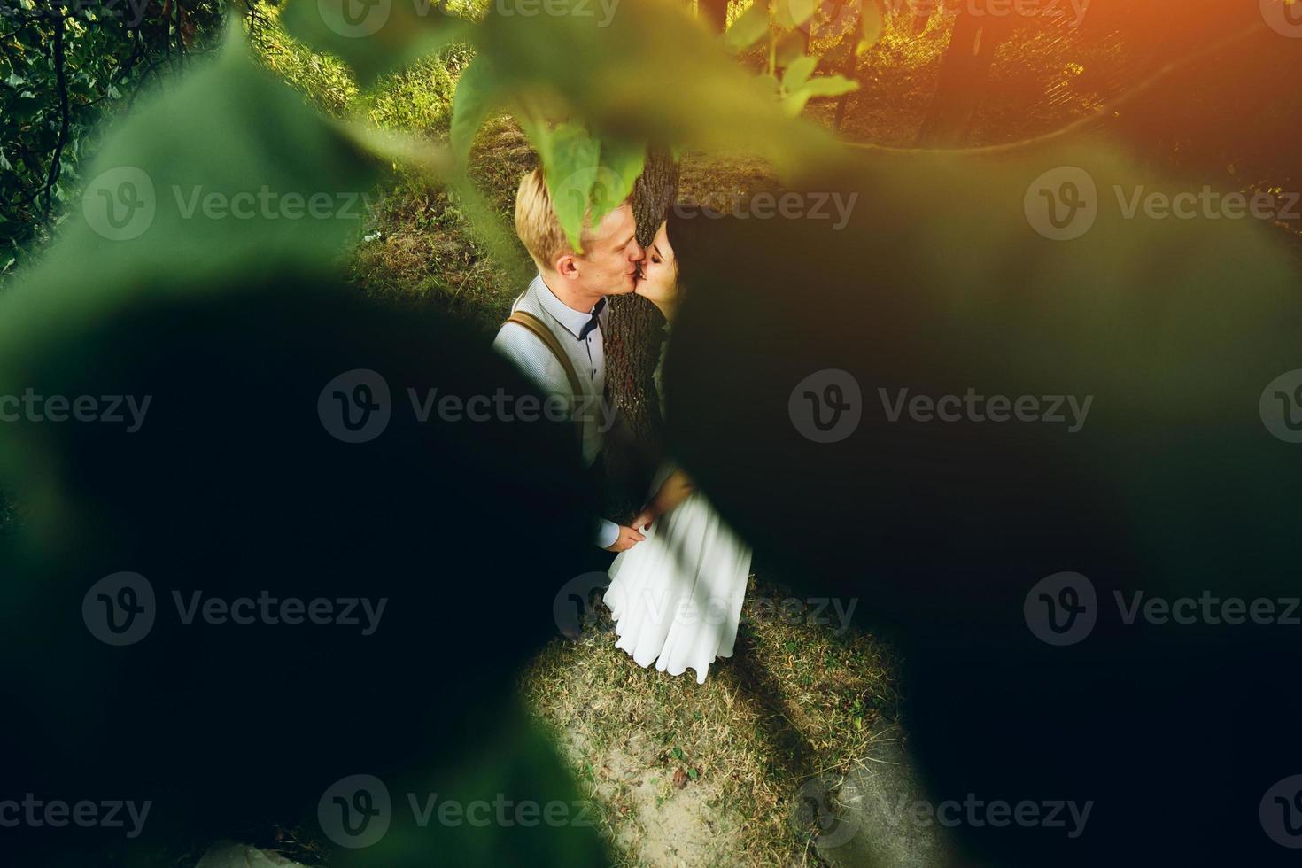 Beautiful wedding couple posing photo