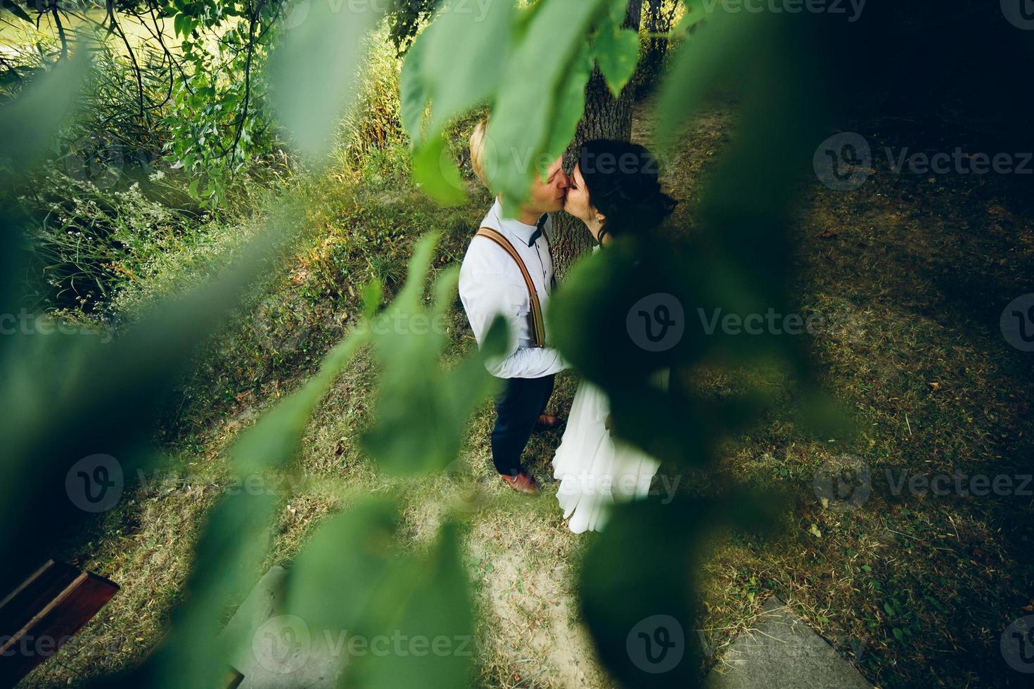 Beautiful wedding couple posing photo