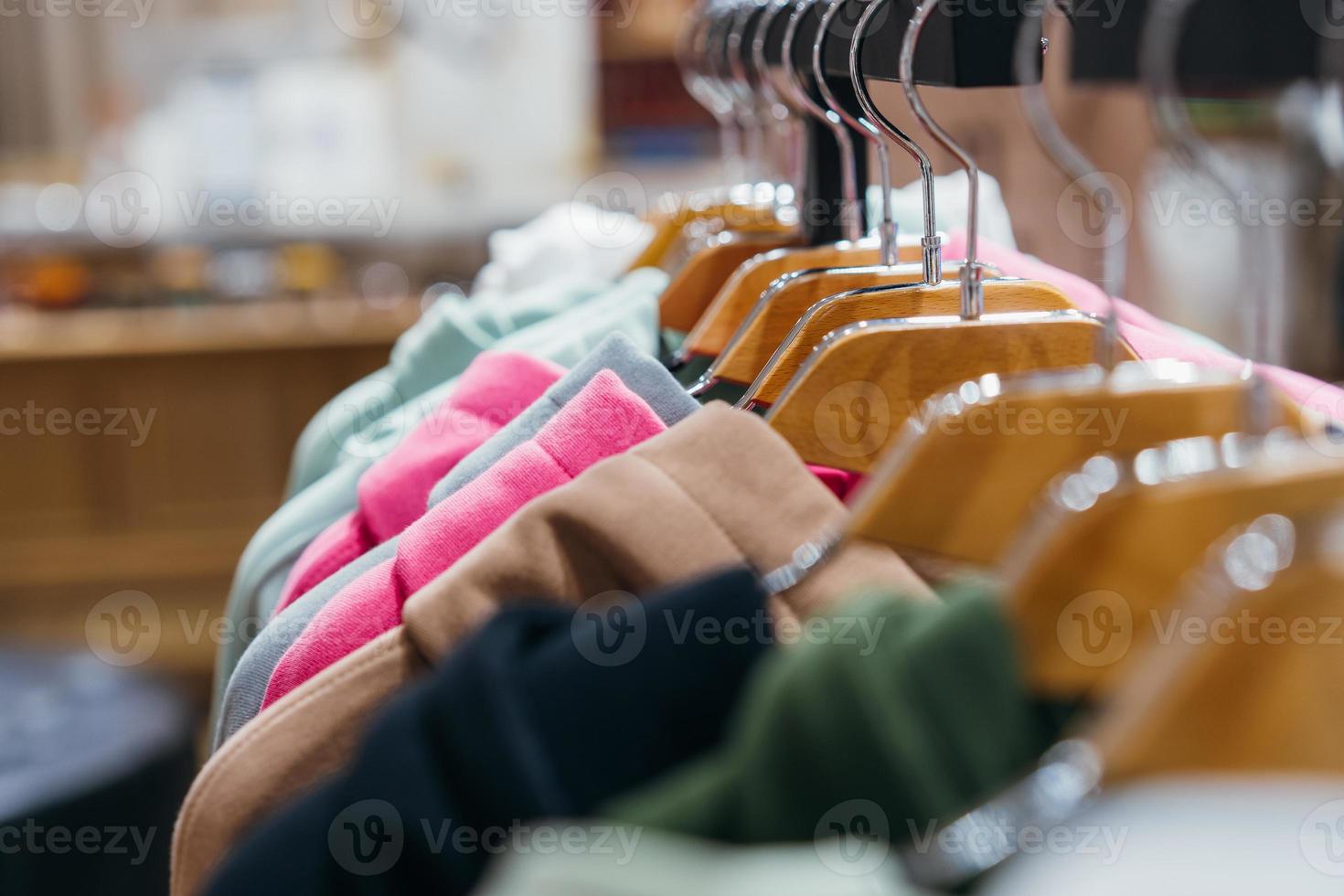 fashion clothing on hangers at the show photo