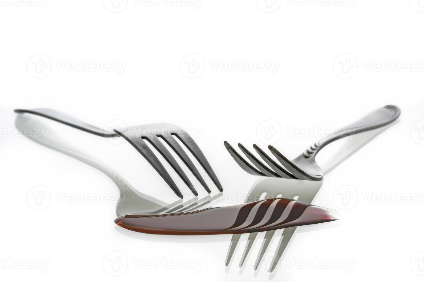 Two forks and reflection photo