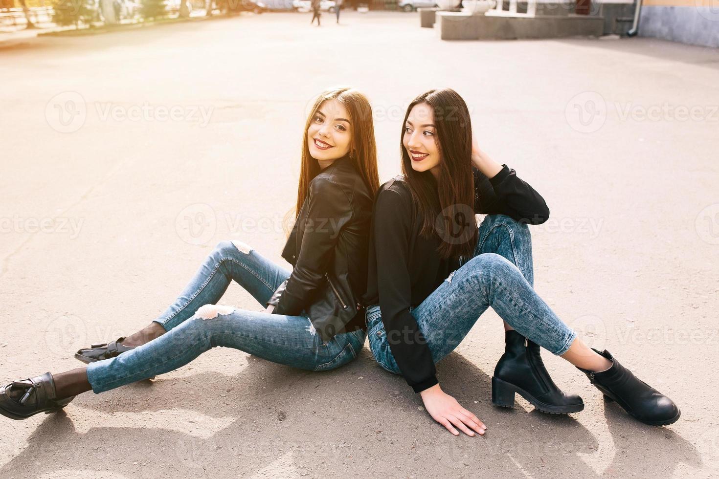 Two young adult girls photo