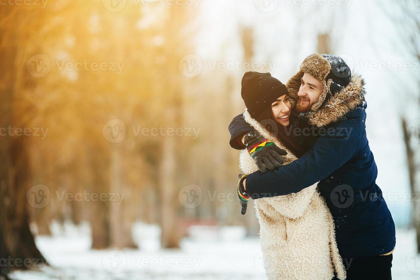 guy and girl in each other's arms photo