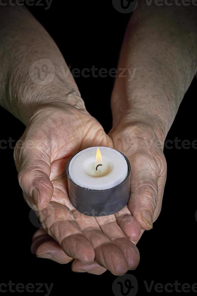 Hands and candle photo