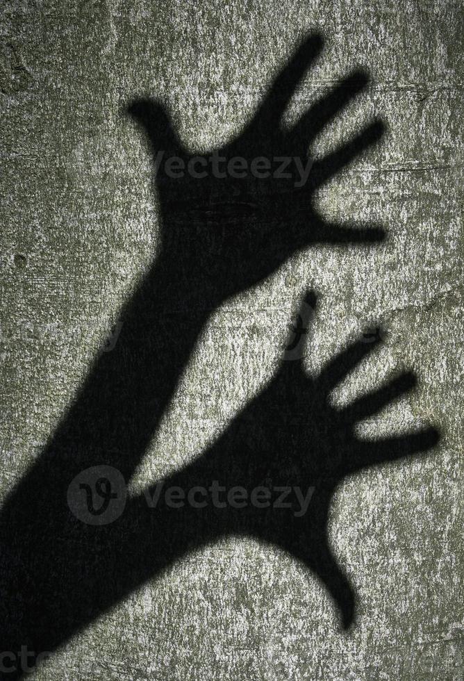 Two shadows hands photo