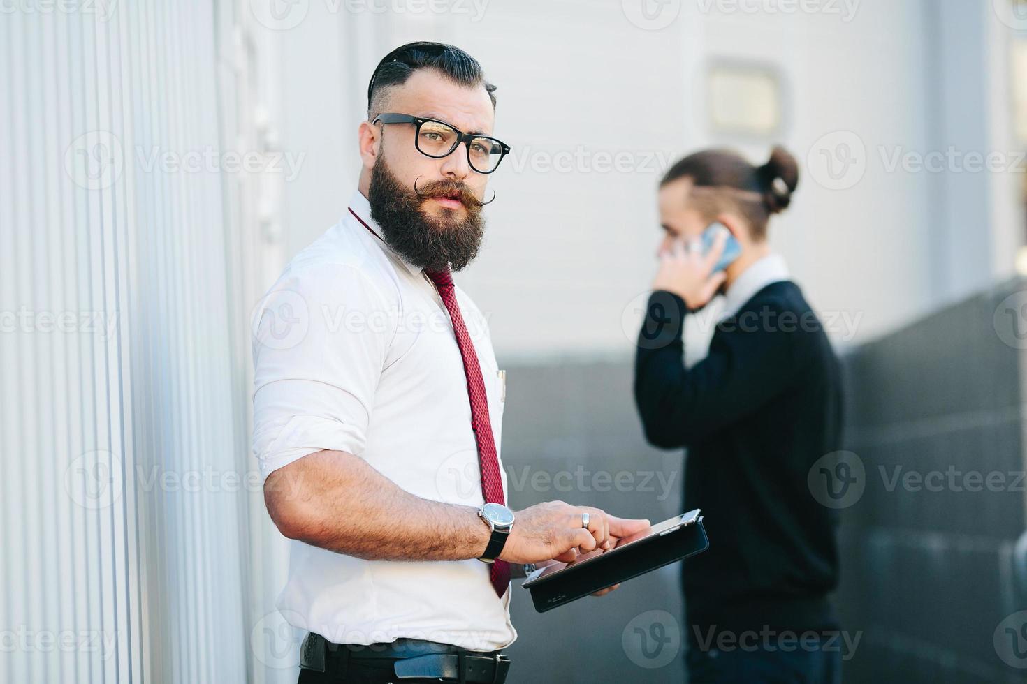 Two businessman at work photo