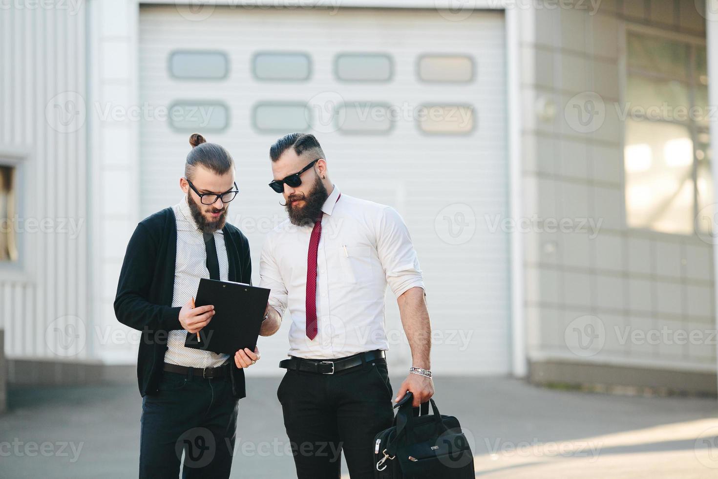 Two businessman at work photo