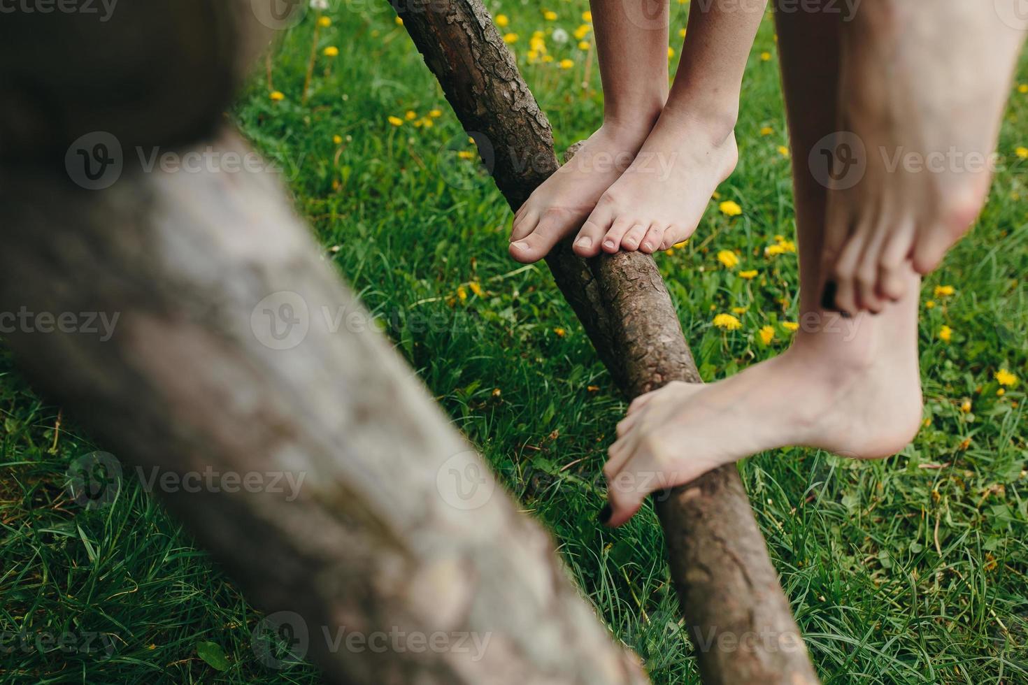 Girls climb by the ledder photo