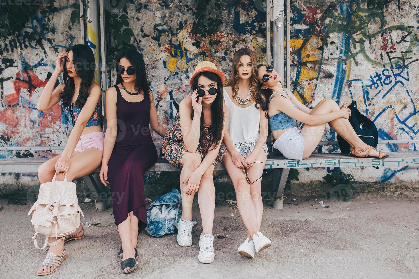 Five beautiful young girls relaxing photo