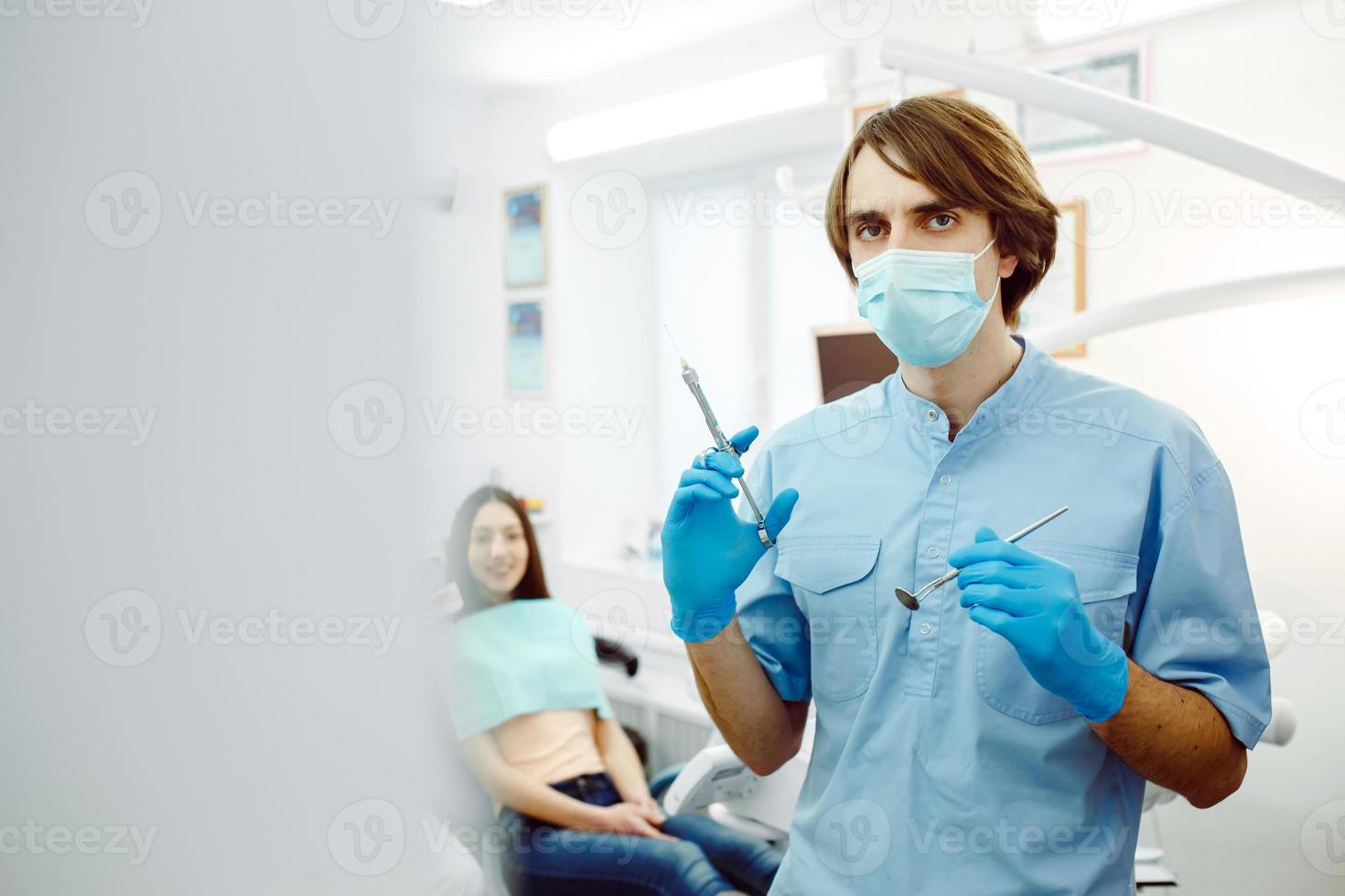 Dental anesthesia on the background of the patient photo