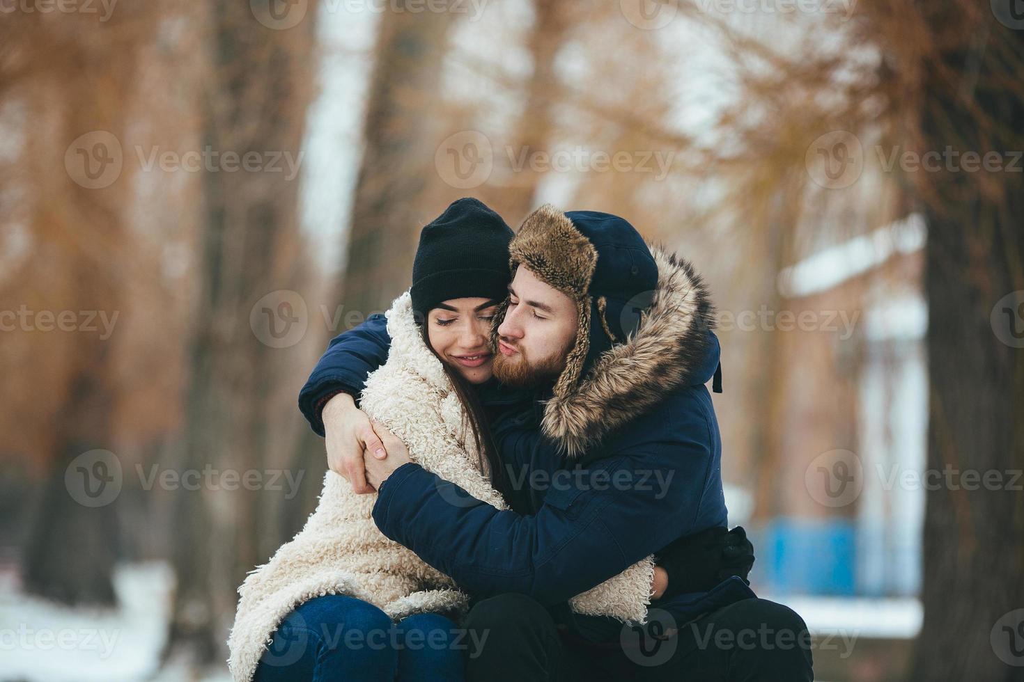 man and woman posing for the camera photo