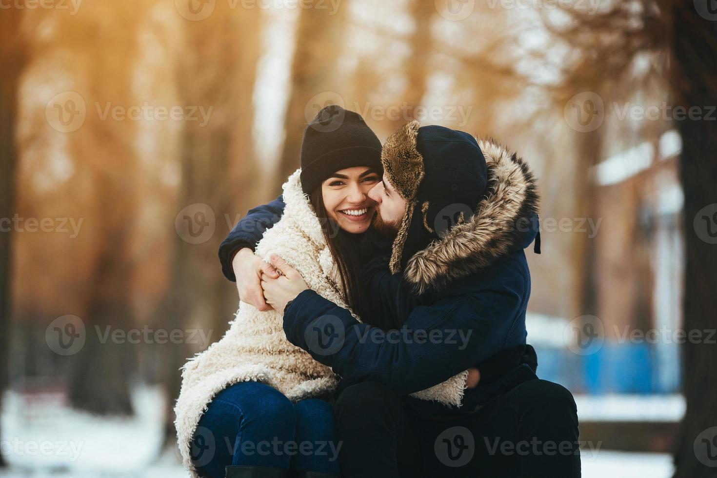 man and woman posing for the camera photo