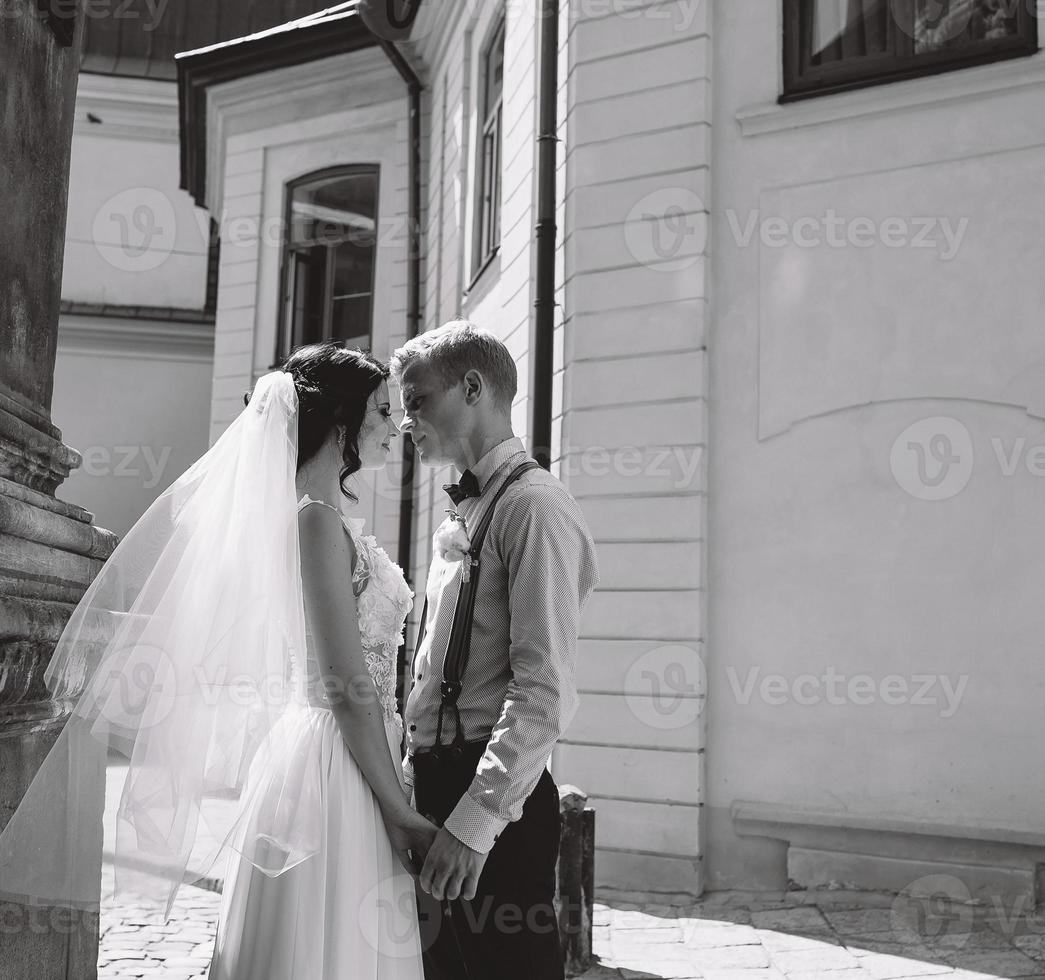 The bride and groom posing photo