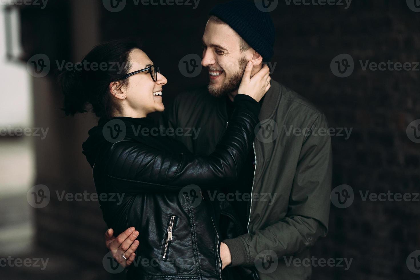 couple posing in backstreet photo