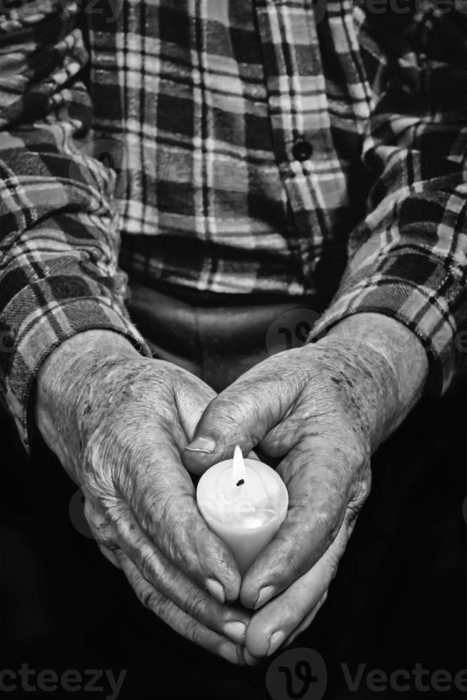 Hands and candle photo