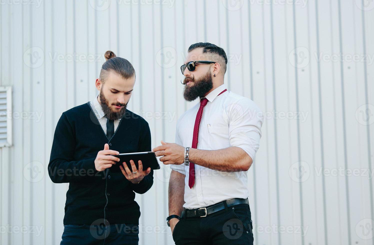 Two businessmen discussing something photo