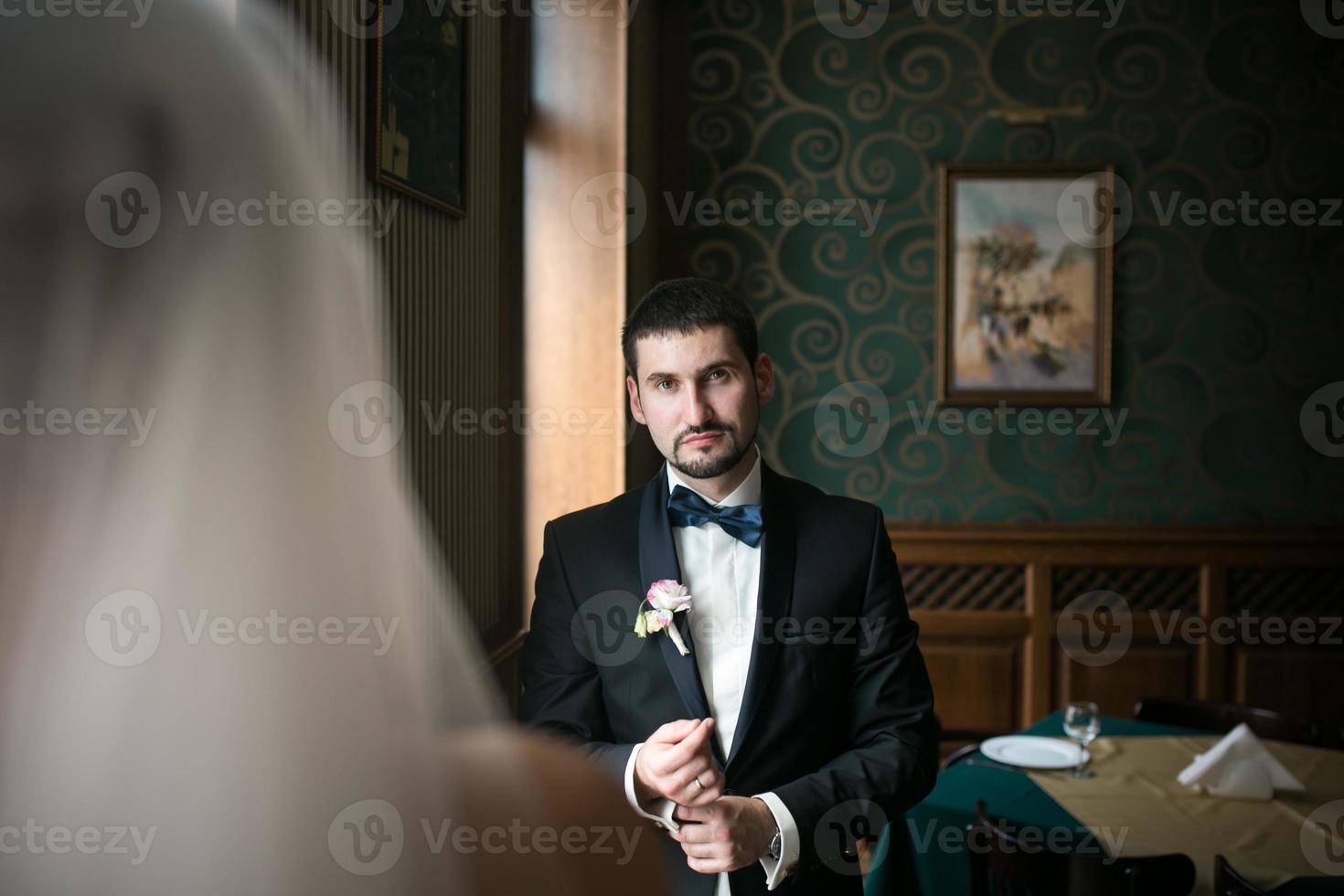 bride and groom are sitting opposite each other 11521621 Stock Photo at