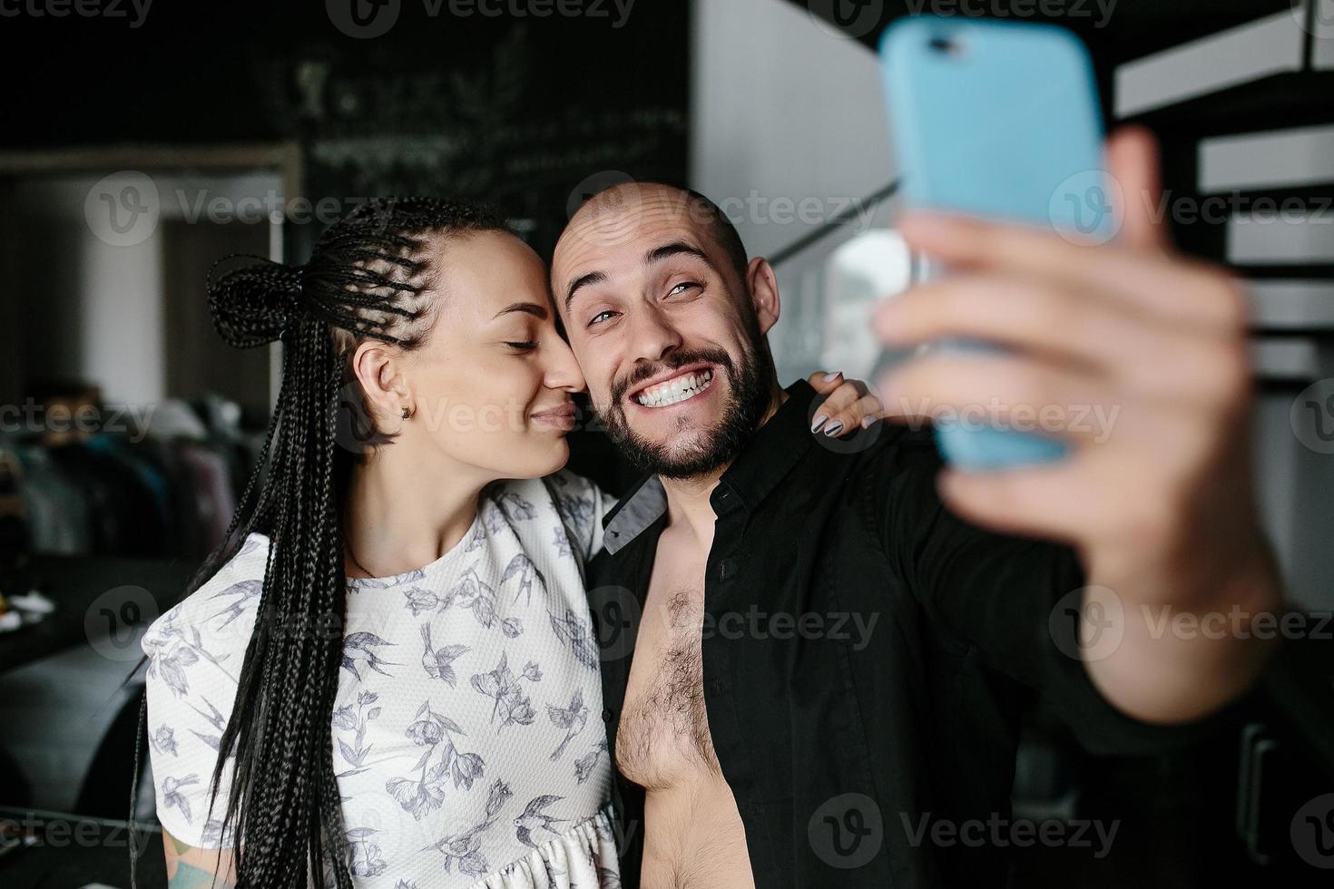 man and woman making selfie photo