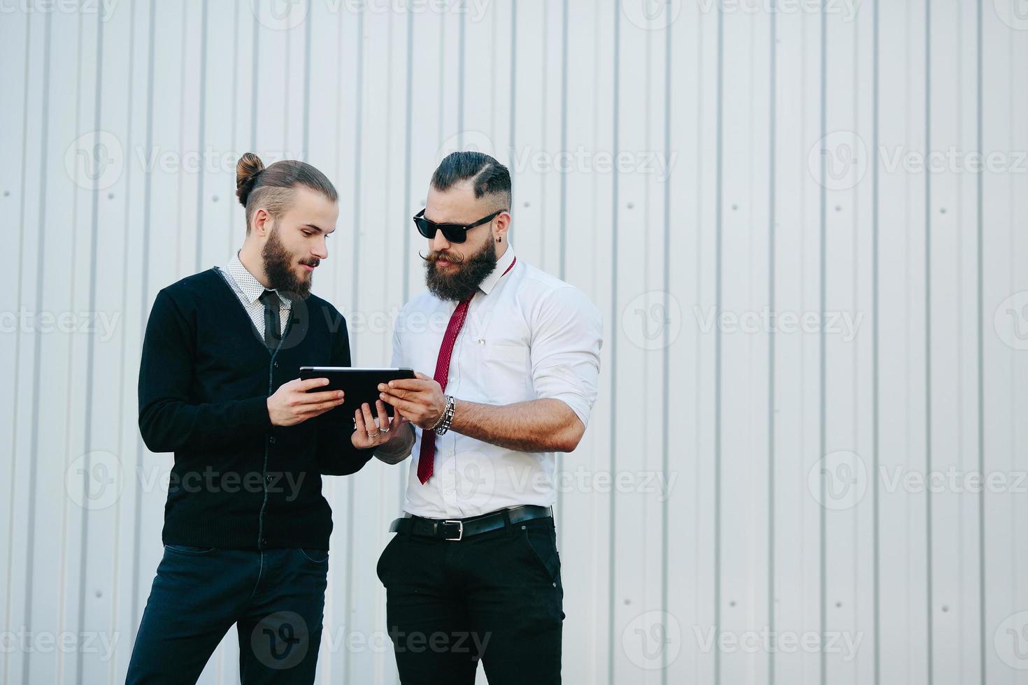 Two businessmen discussing something photo