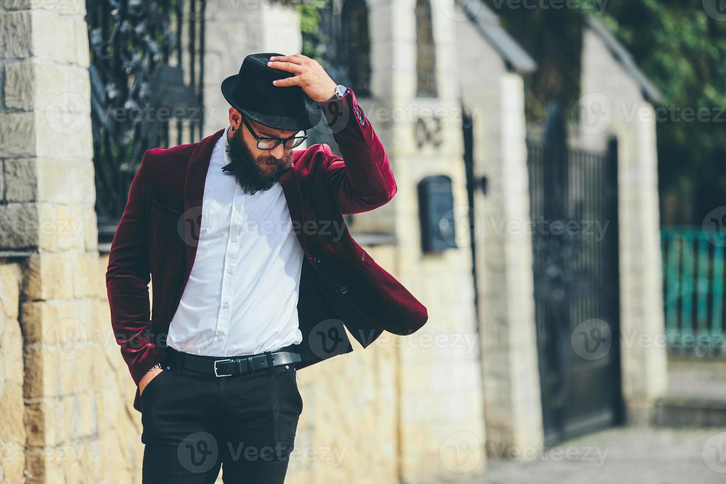 A rich man with a beard, thinking about business photo