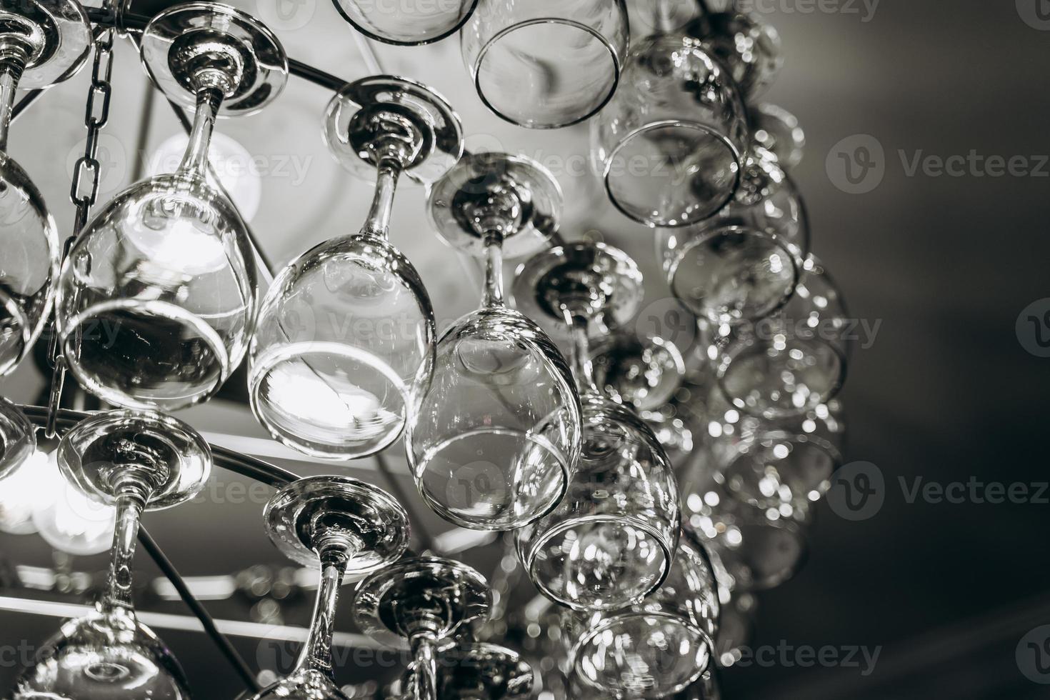 Beautiful chandelier made with glasses of wine photo