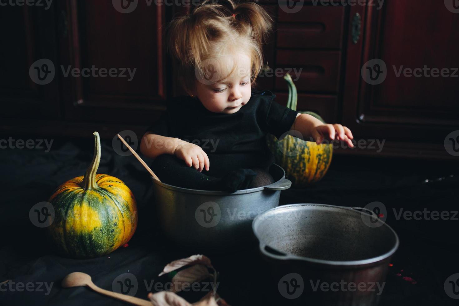 little girl playing in a witch photo