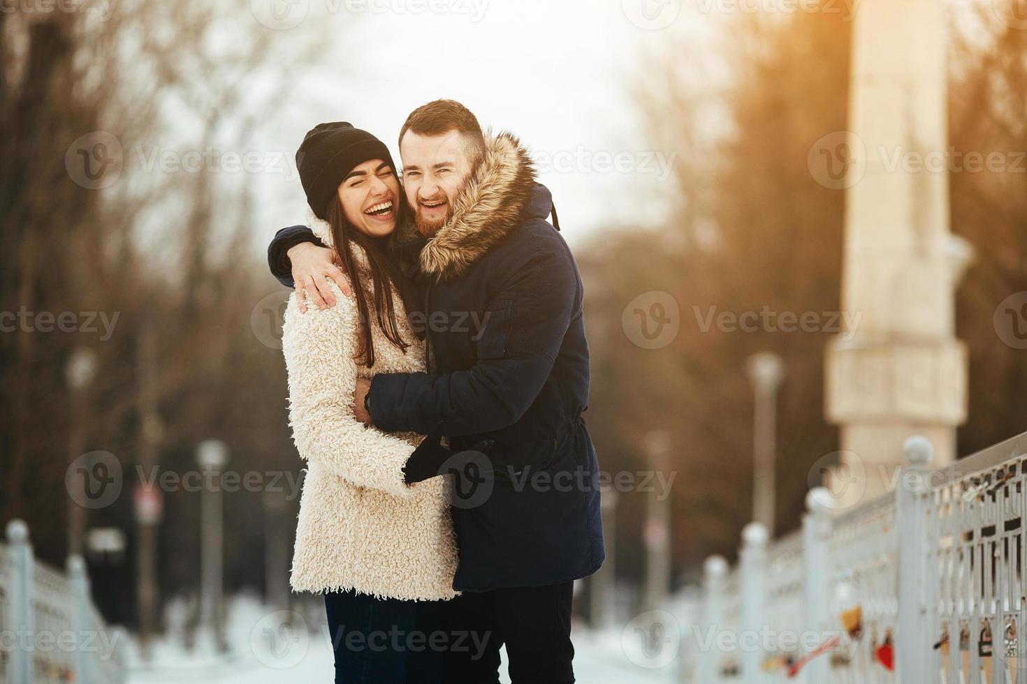 man and woman posing for the camera photo