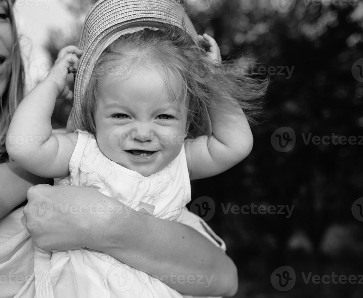 mother and daughter together outdoors photo