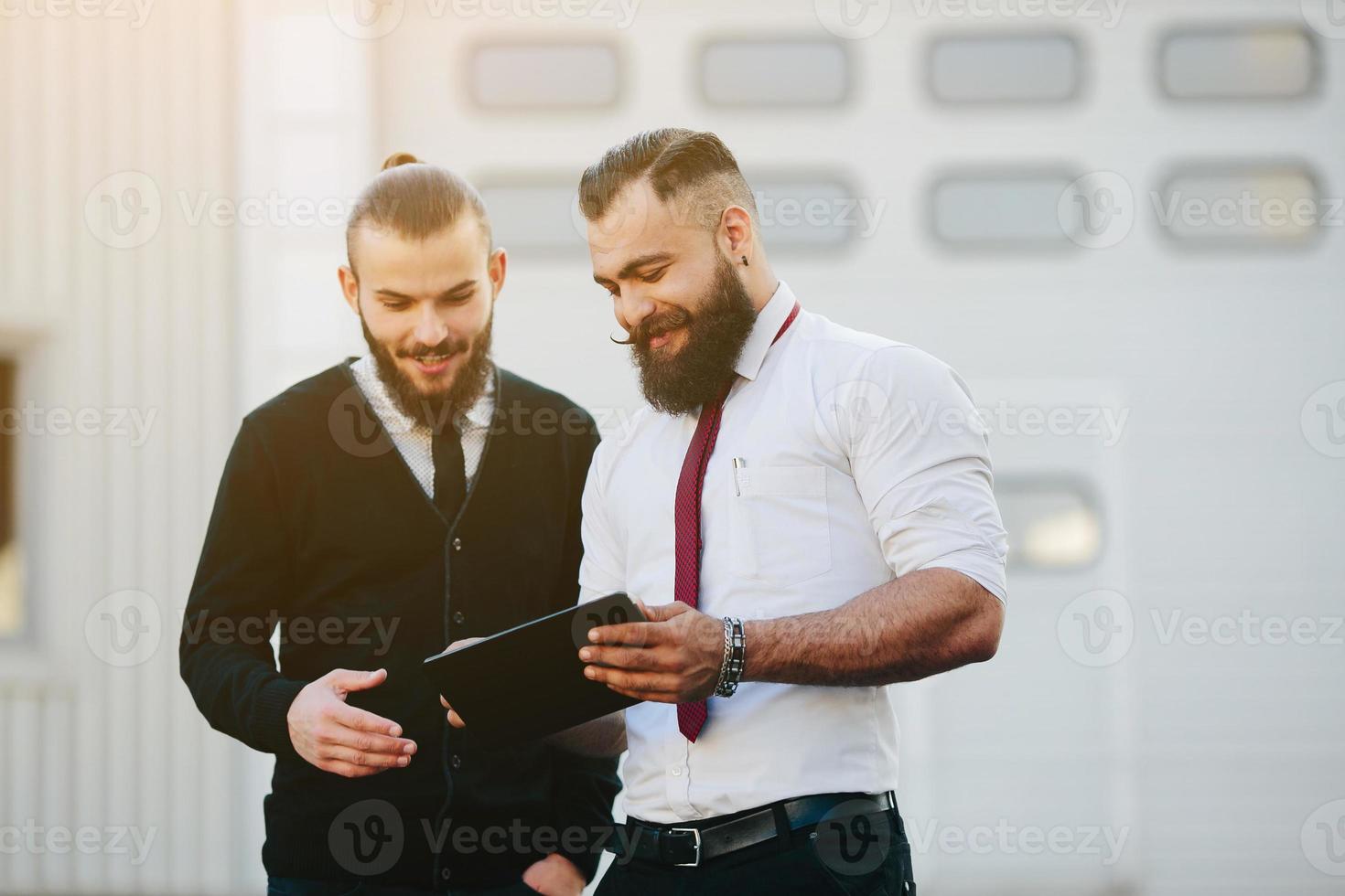 Two businessmen discussing something photo