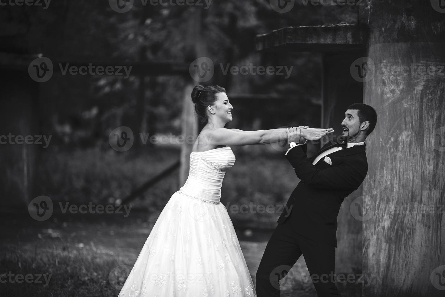 bride and groom having fun photo