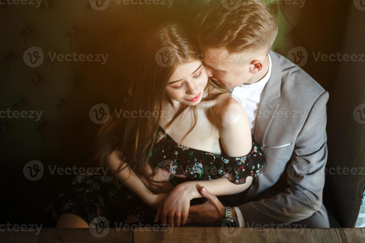 Young couple posing at the camera photo