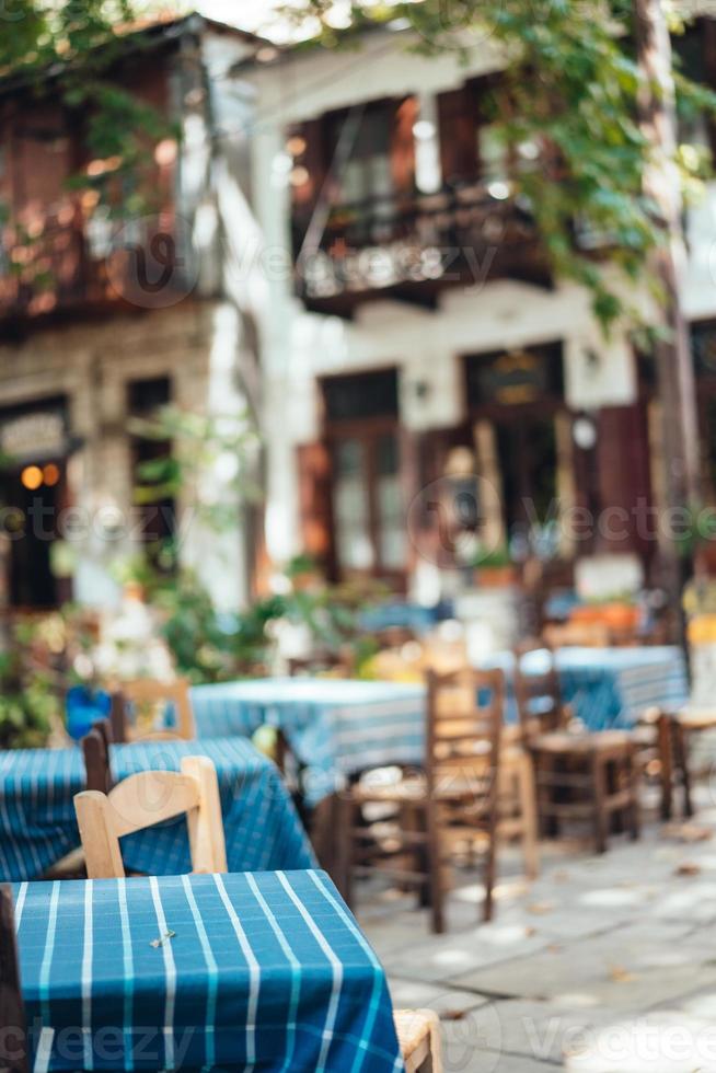 Street cafe in the narrow streets of the city. photo