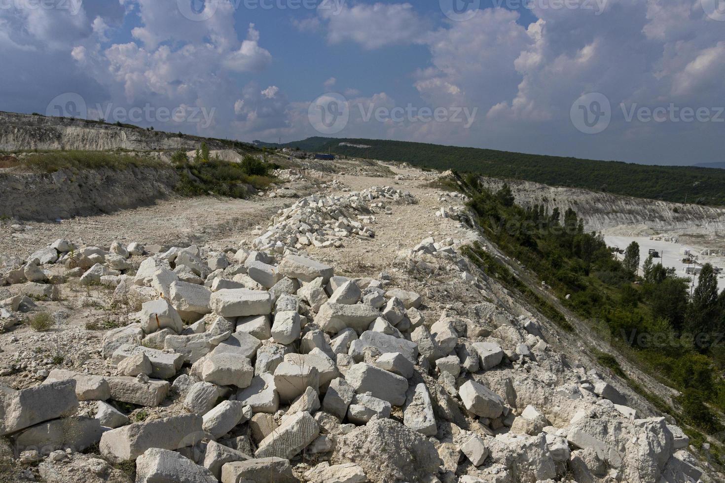 Extraction and primary processing of limestone and gypsum stone in a quarry. photo