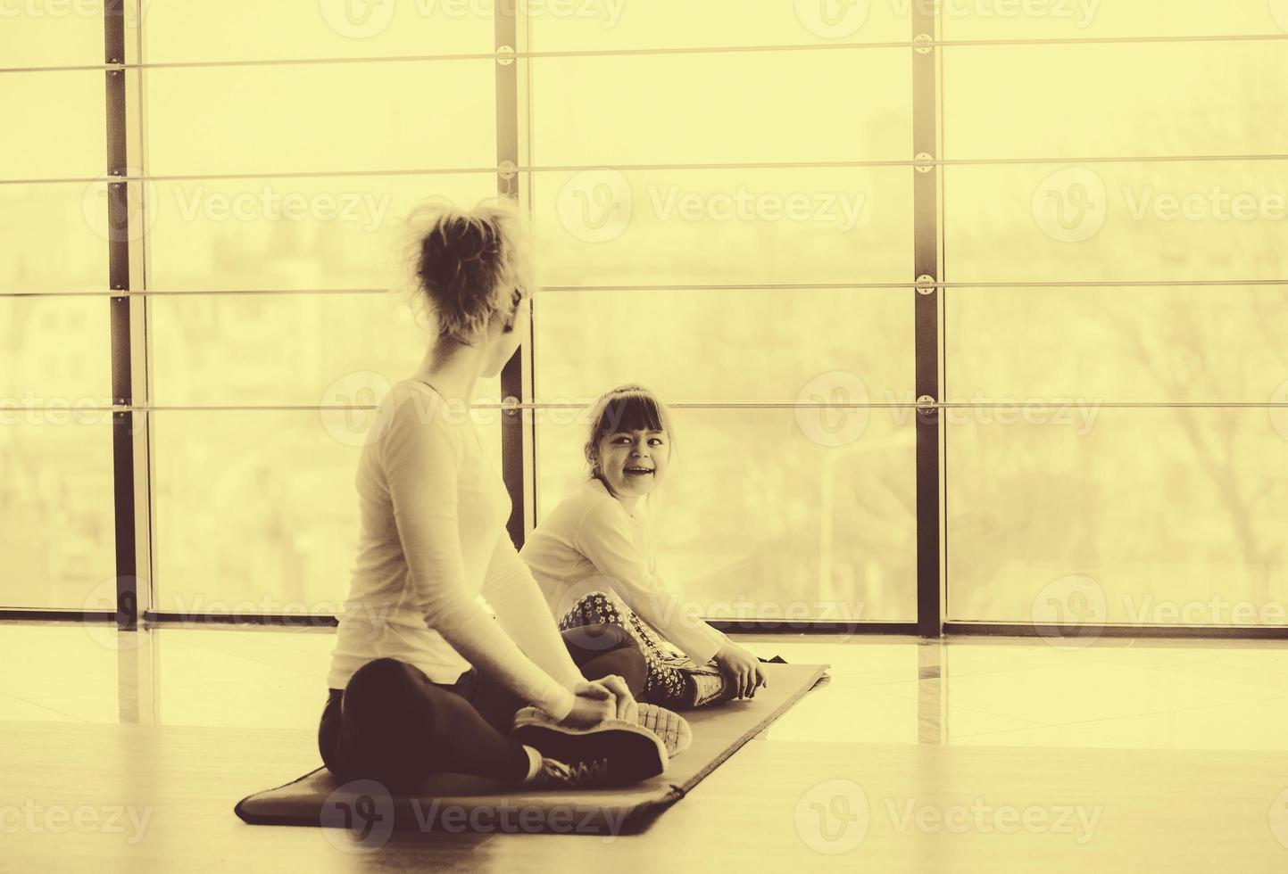 Charming family spends time in the gym photo
