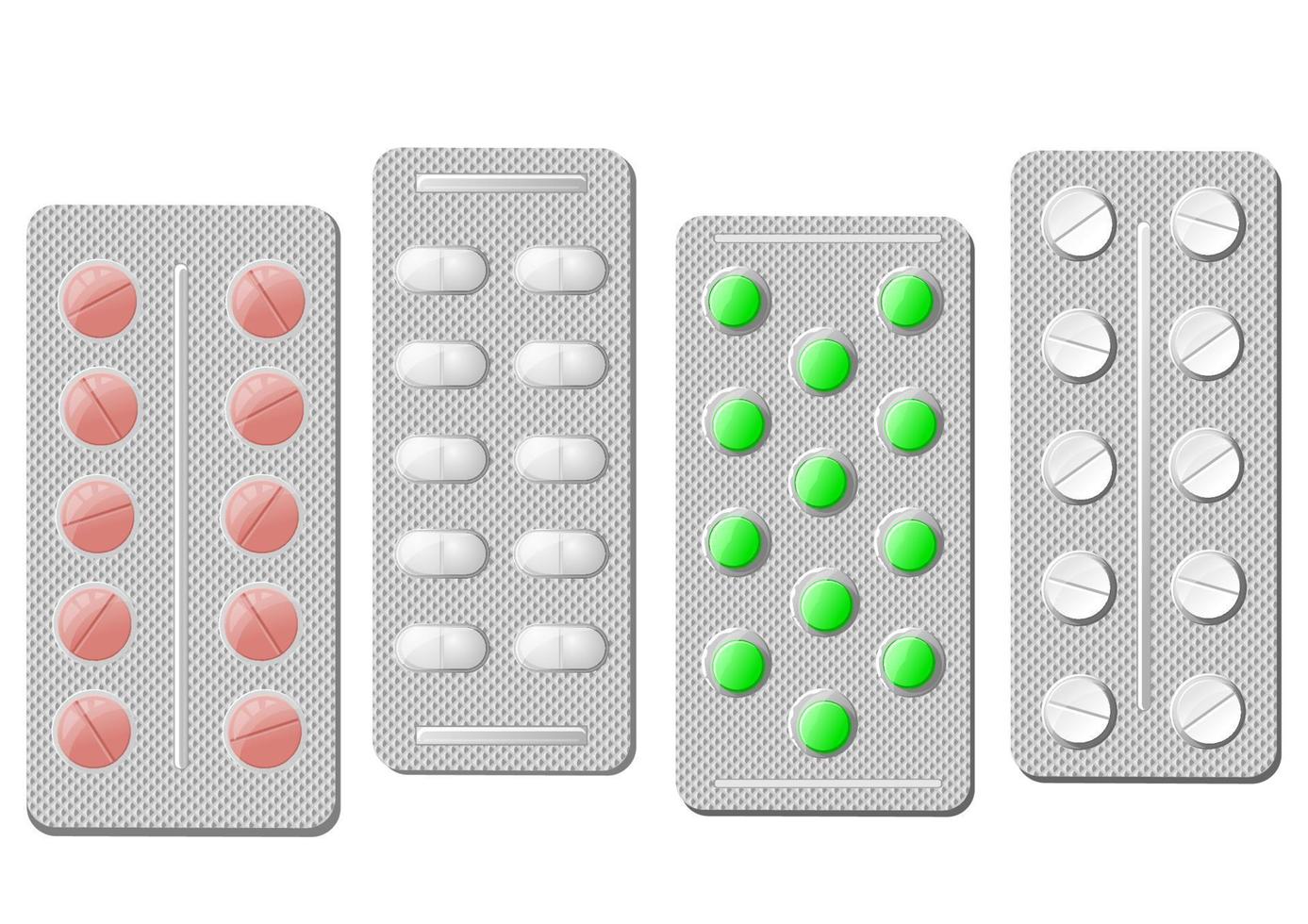 Realistic pills in silver blisters with reflection vector