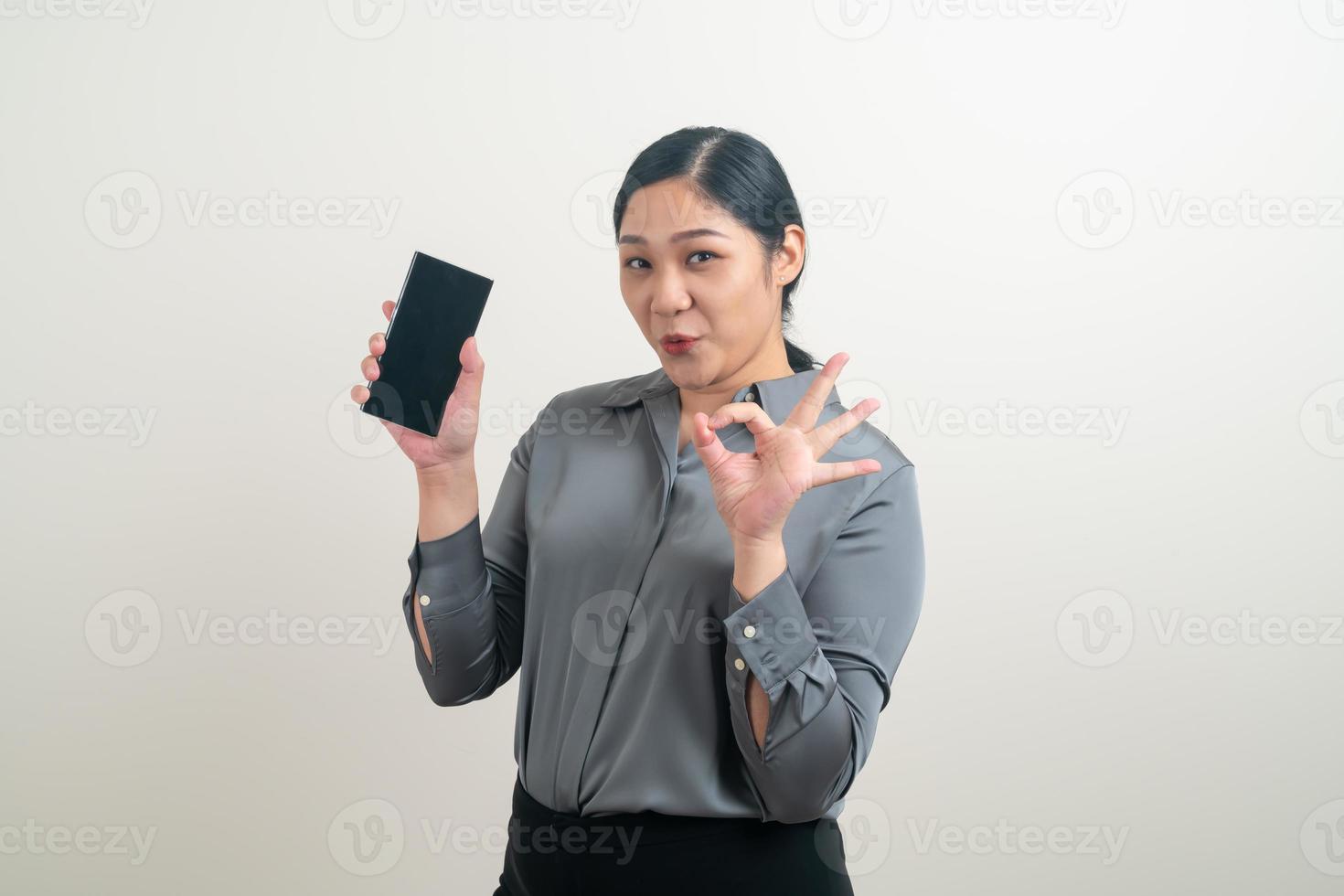 Asian woman using smartphone or mobile phone photo