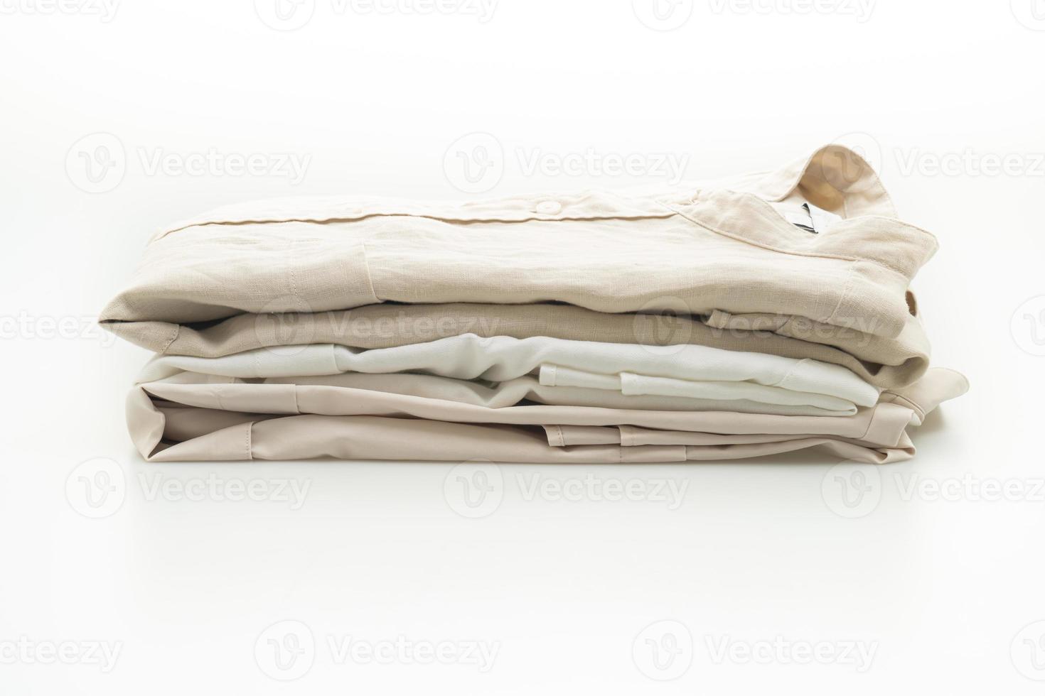 beige shirt fold on white background photo