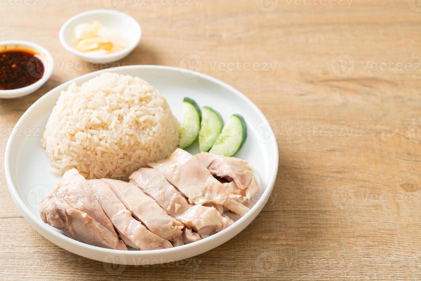 Hainanese chicken rice or rice steamed with chicken soup photo