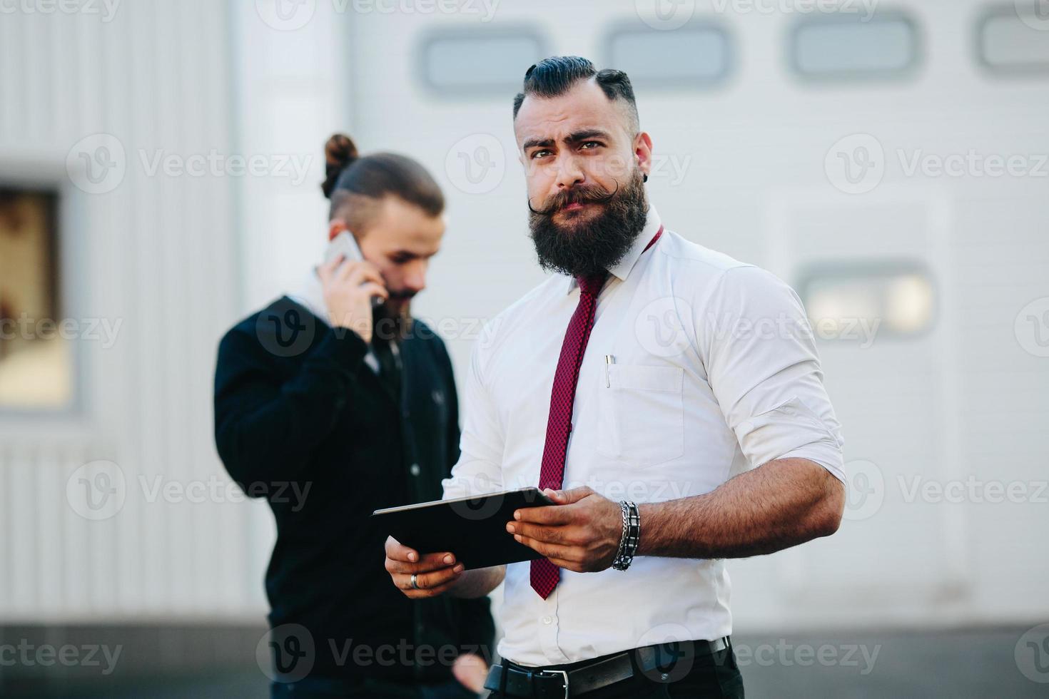 Two businessman at work photo