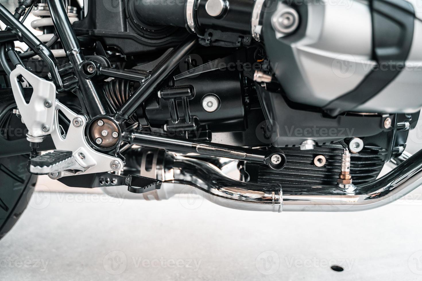 Cropped image of new motorcycle in shop. photo
